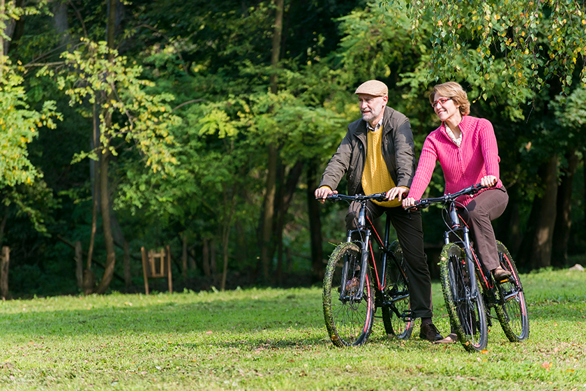 Senior couple riding bicycles